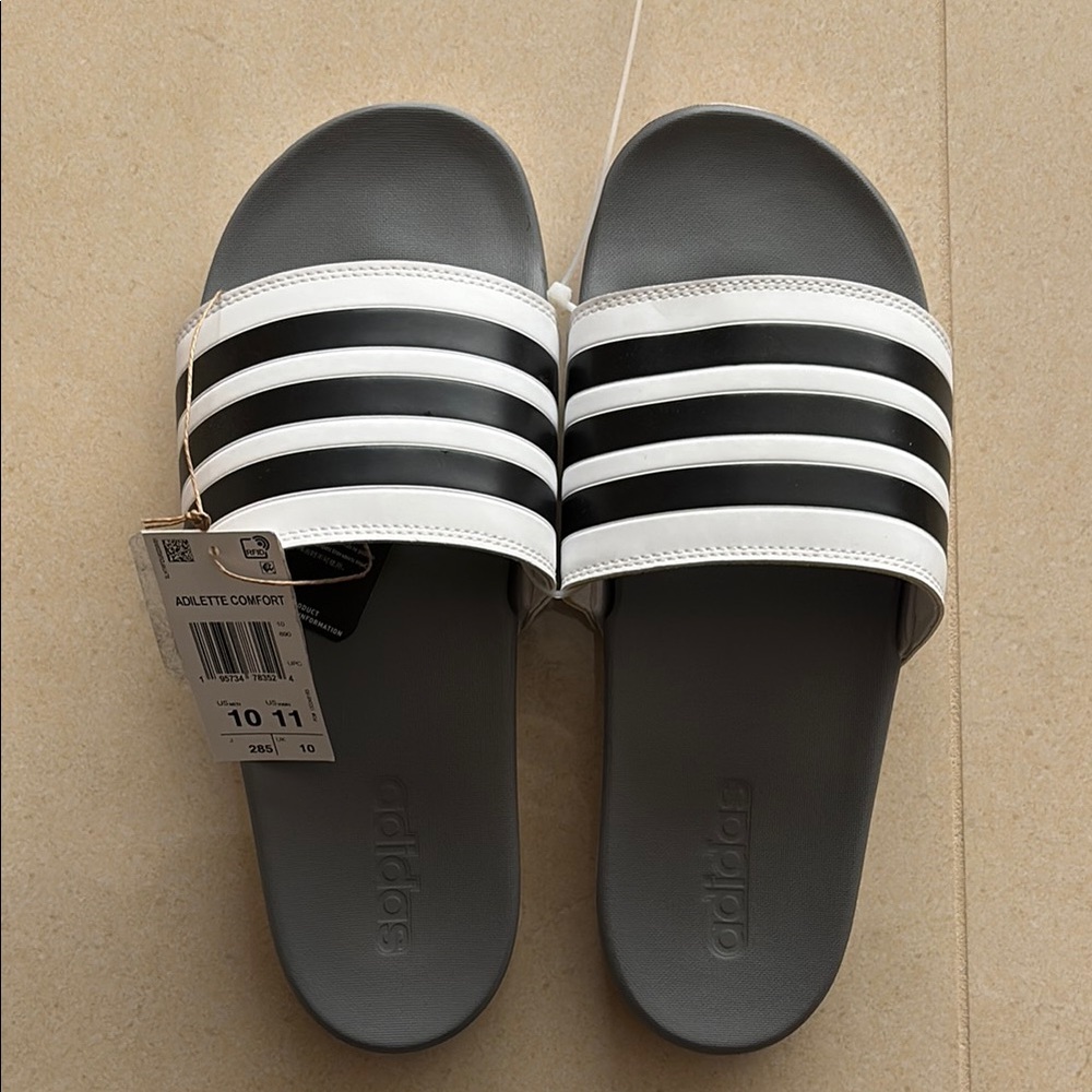 NWT Adidas Black and White Adilette Slides size 10. New tags attached.